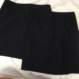 Two black business skirts